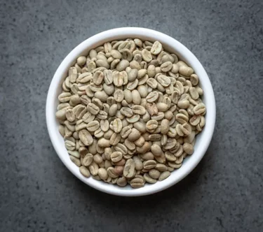 Colombia FTO green coffee beans in a white bowl