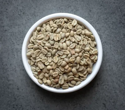 Colombia FTO green coffee beans in a white bowl