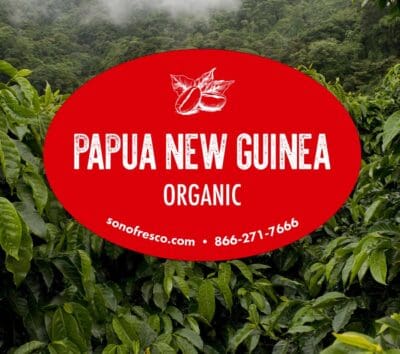 Papua New Guinea Organic coffee label over lush green coffee plants in PNG highlands
