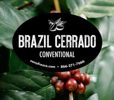 Brazil Cerrado Conventional coffee label over ripe red coffee cherries
