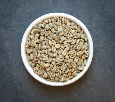 Guatemala Fair Trade Organic green coffee beans in a white bowl